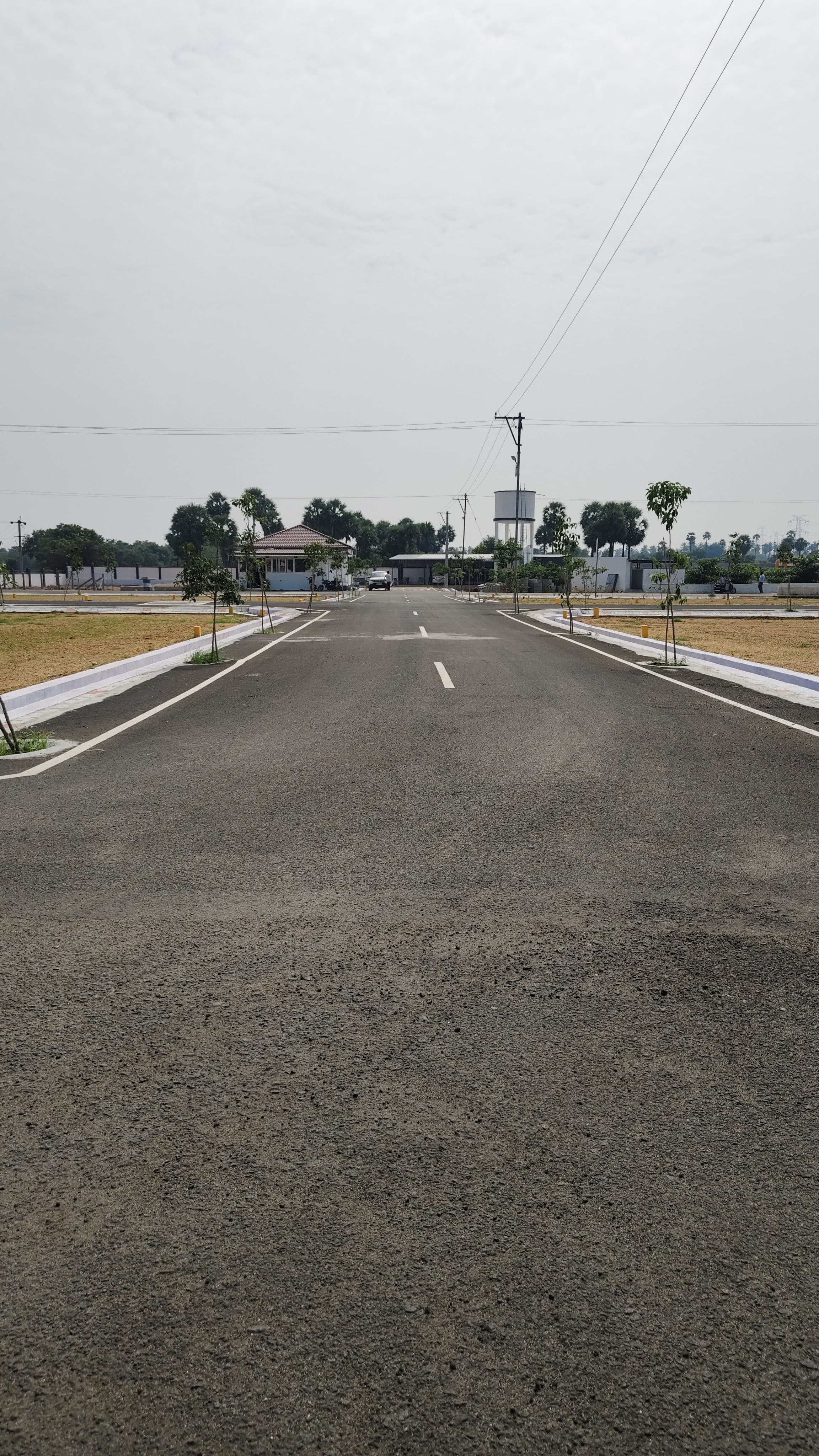 Formed roads and gated entrance at the Property Nanban layout, Elimedu