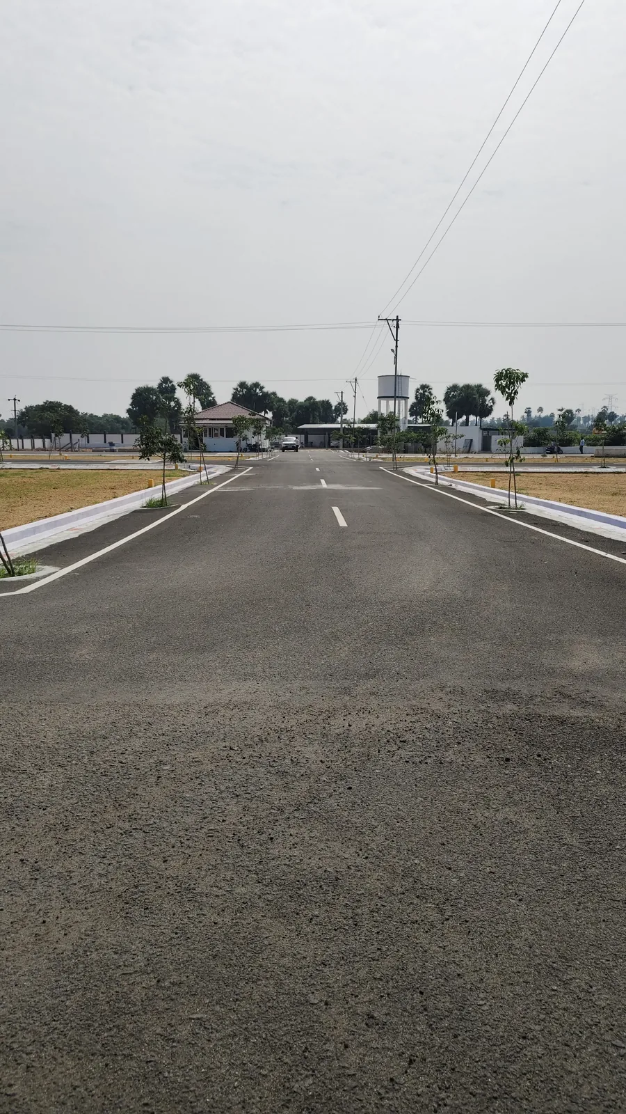 Formed roads and gated entrance at the Property Nanban layout, Elimedu