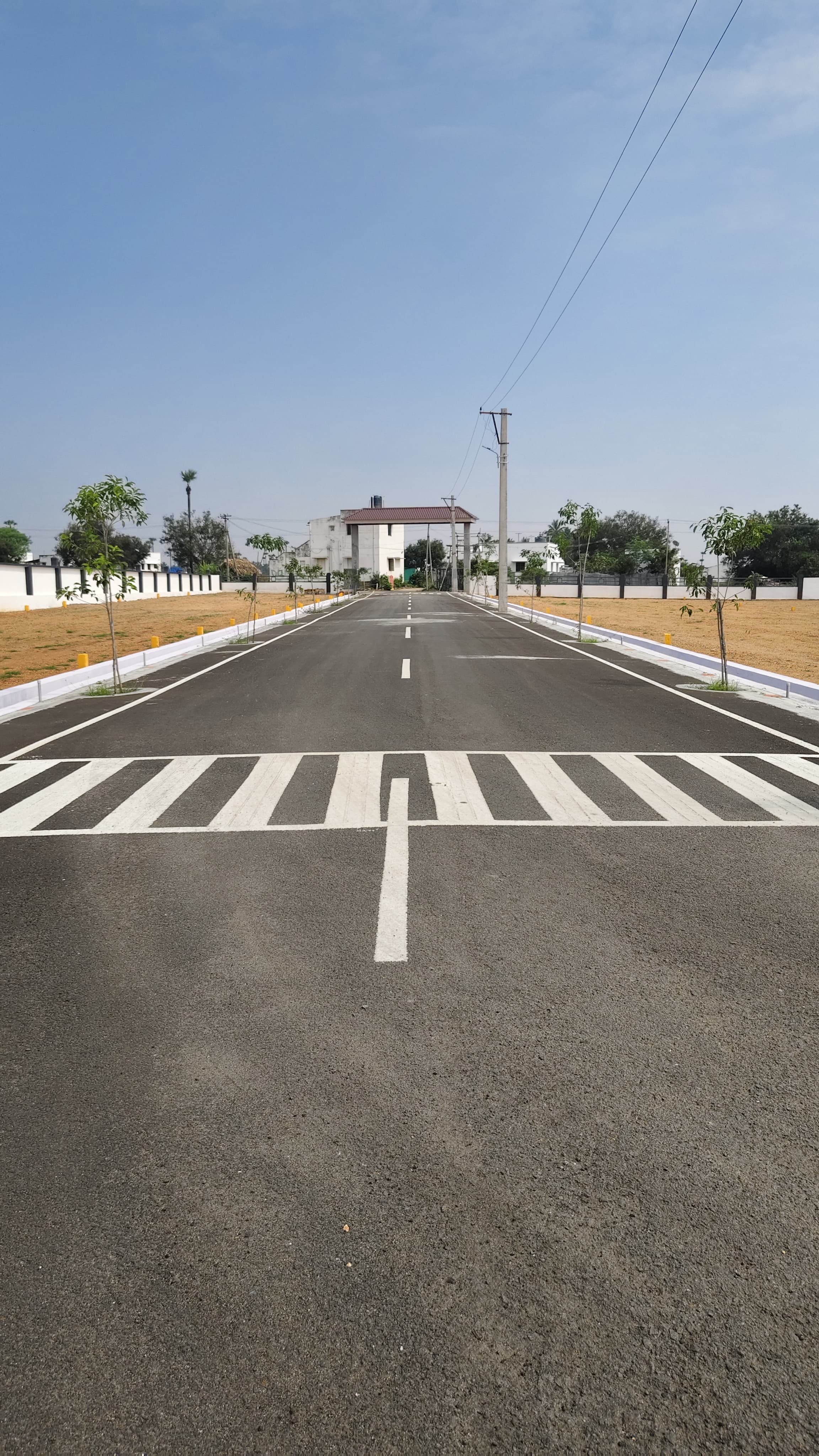 Wide tar roads with markings and street lights, Tiruchengode